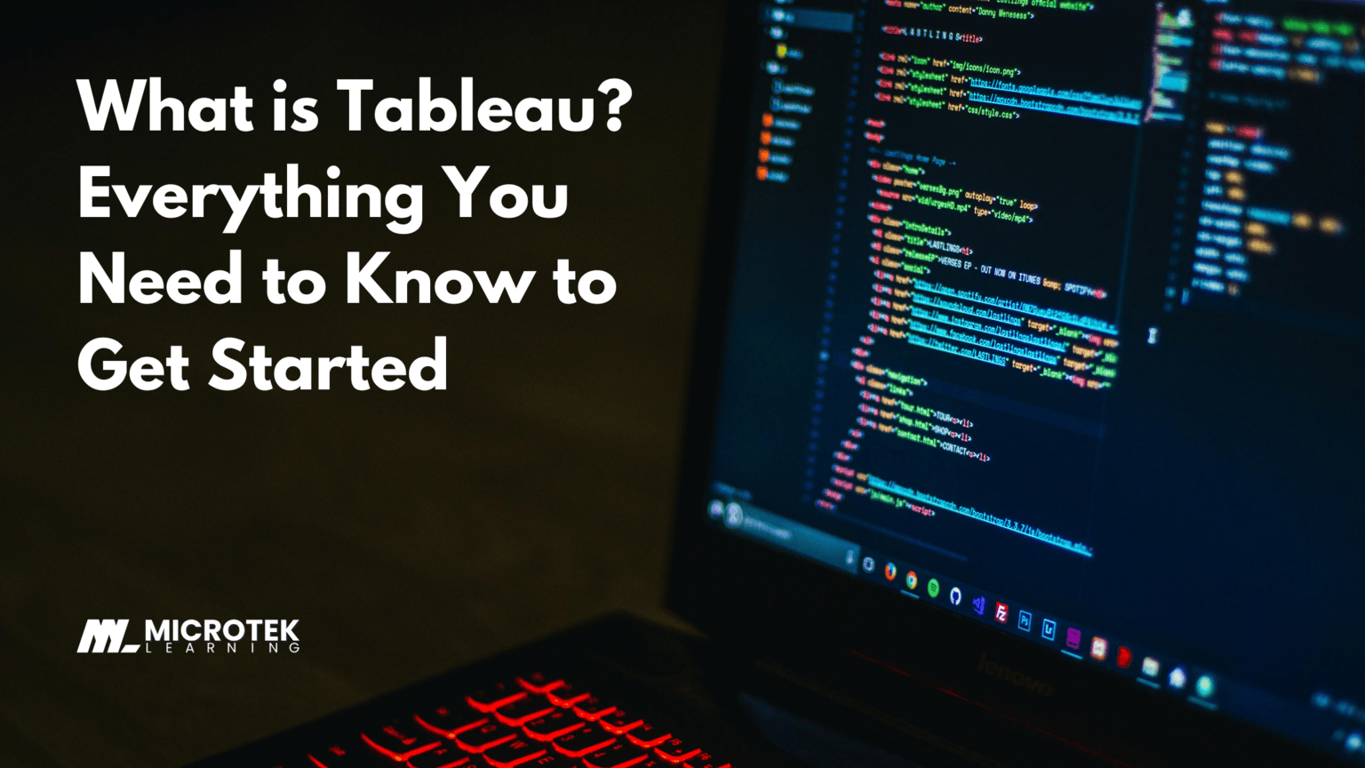 Image with a dark background showing code on a laptop screen. Text reads 'What is Tableau? Everything You Need to Know to Get Started' with the Microtek Learning logo